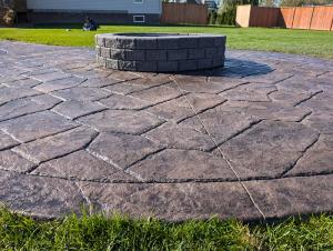 colored stamped flagstone concrete firepit