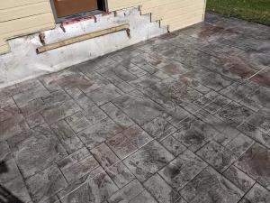 slate colored stamped concrete pad