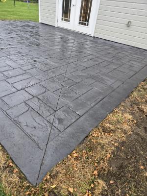 stamped concrete patio backyard